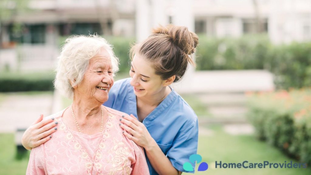 A nurse providing care to an elderly woman.