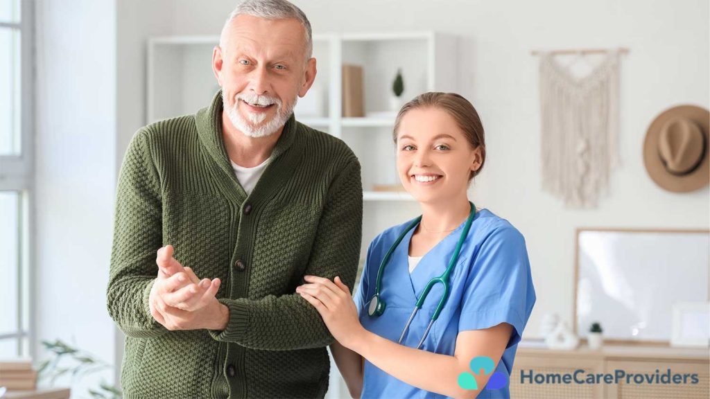 Nurse helping an elderly man with care at home